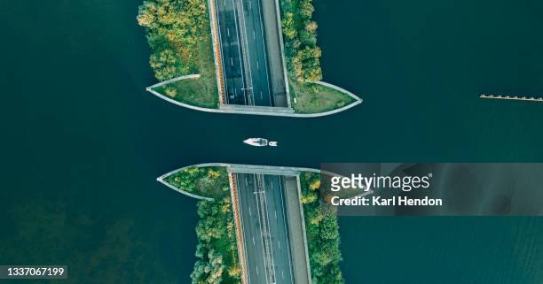 an aerial view of veluwemeer aqueduct - stock photo - brug stockfoto's en -beelden