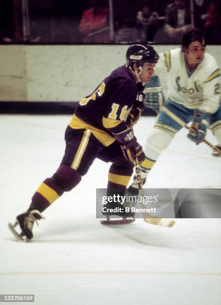 Marcel Dionne of the Los Angeles Kings skates on the ice during an NHL game against the California Golden Seals circa 1976 at the Oakland Coliseum...