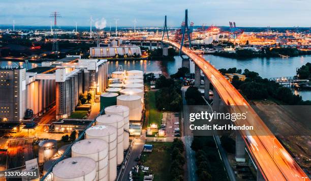 an aerial view of an industrial zone / power station at night - stock photo - hamburg stock pictures, royalty-free photos & images