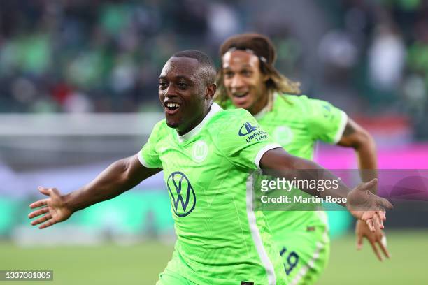 Jerome Roussillon of VfL Wolfsburg celebrates after scoring their sides first goal during the Bundesliga match between VfL Wolfsburg and RB Leipzig...