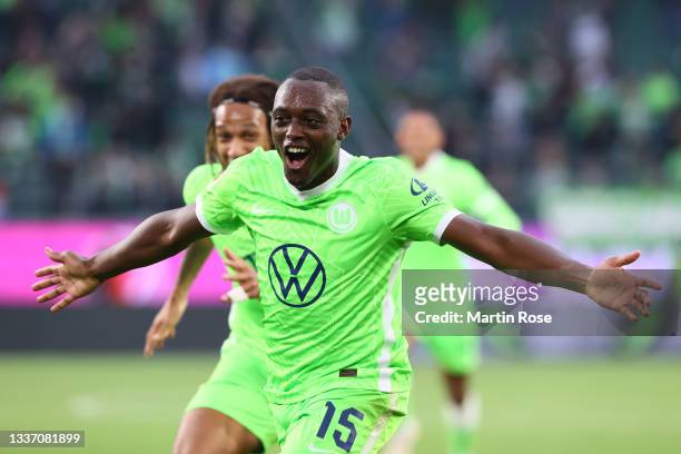 Jerome Roussillon of VfL Wolfsburg celebrates after scoring their sides first goal during the Bundesliga match between VfL Wolfsburg and RB Leipzig...