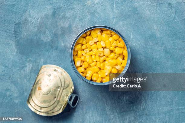 canned sweet corn - canned goods stock-fotos und bilder