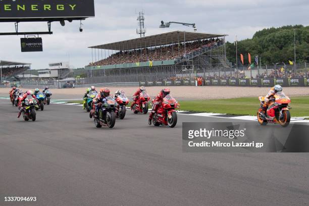 The MotoGP riders start from the grid during the MotoGP race during the MotoGP of Great Britain - Race at Silverstone Circuit on August 29, 2021 in...