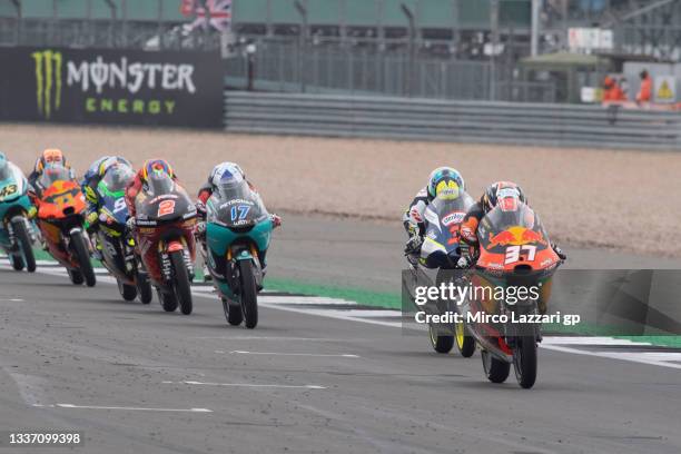 Pedro Acosta of Spain and Red Bull KTM Ajo leads the field during the Moto3 race during the MotoGP of Great Britain - Race at Silverstone Circuit on...