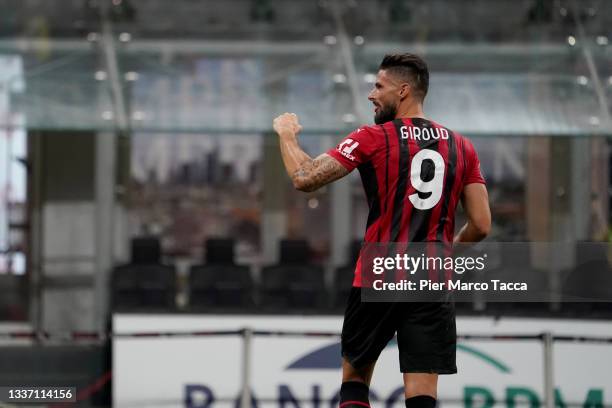 Olivier Giroud of AC Milan celebrates during the Serie A match between AC Milan and Cagliari Calcio at Stadio Giuseppe Meazza on August 29, 2021 in...