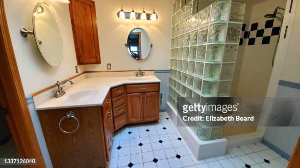 bathroom renovation: before - bathroom vanity stock-fotos und bilder