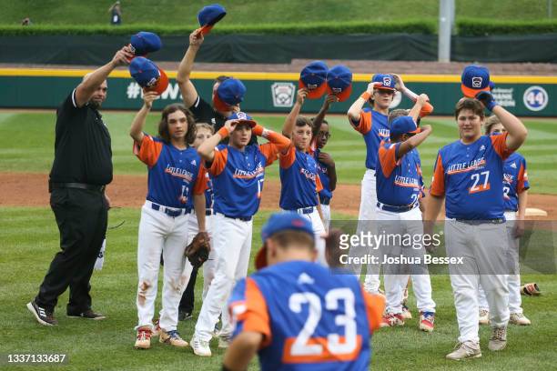 Team Michigan players celebrate winning the 2021 Little League World Series championship game against Team Ohio at Howard J. Lamade Stadium on August...