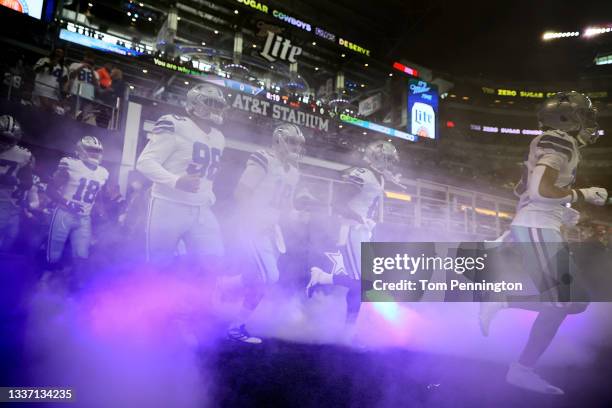 The Dallas Cowboys take the field agains the Jacksonville Jaguars during a NFL preseason game at AT&T Stadium on August 29, 2021 in Arlington, Texas.