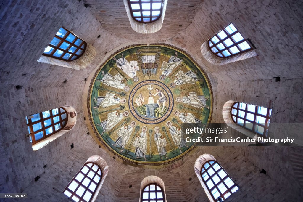 Dome details with byzantine mosaics of the Arian Baptistery (Battistero degli Ariani) in Ravenna, Italy