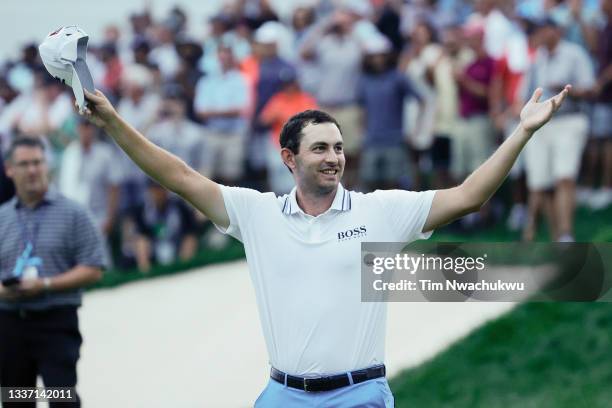 Patrick Cantlay of the United States celebrates after defeating Bryson DeChambeau of the United States on the sixth playoff hole during the final...