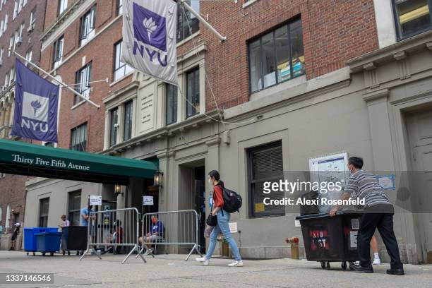 New York University students move into Rubin Hall on August 29, 2021 in New York City. NYU resumed all in-person classes and required all students,...