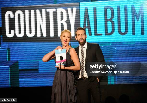 Presenters Katherine Heigl and Josh Kelley speak onstage at the 2011 American Music Awards held at Nokia Theatre L.A. LIVE on November 20, 2011 in...