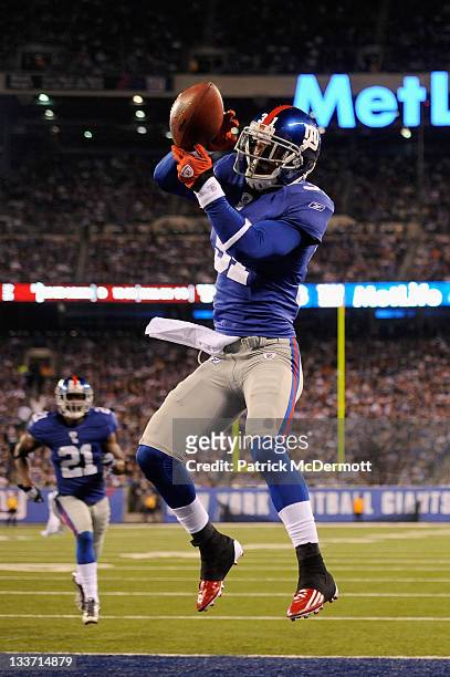 Aaron Ross of the New York Giants intercepts a pass in the third quarter against the Philadelphia Eagles at MetLife Stadium on November 20, 2011 in...