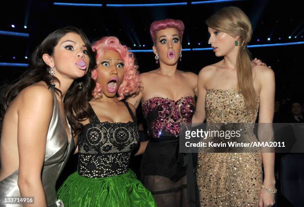 Singers Selena Gomez, Nicki Minaj, Katy Perry, and Taylor Swift pose in the audience during the 2011 American Music Awards held at Nokia Theatre L.A....