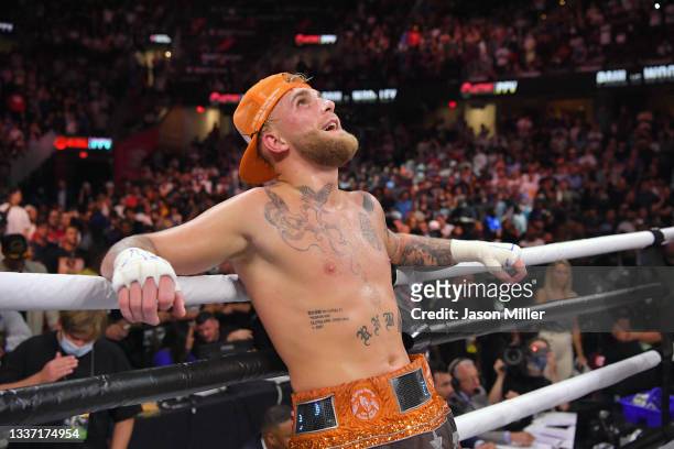 Jake Paul reacts after defeating Tyron Woodley by split decision in their cruiserweight bout during a Showtime pay-per-view event at Rocket Morgage...