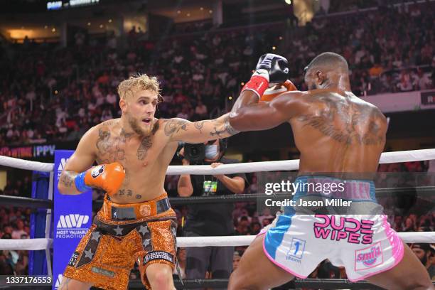 Jake Paul fights Tyron Woodley in their cruiserweight bout during a Showtime pay-per-view event at Rocket Morgage Fieldhouse on August 29, 2021 in...