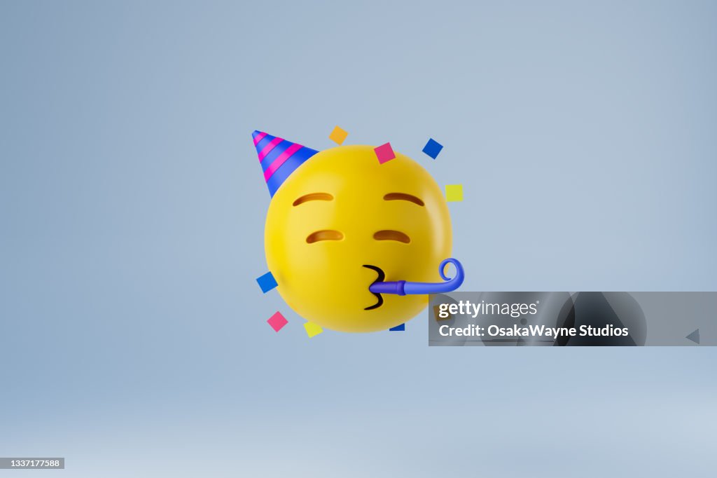 Party theme emoticon face with cone cap and party horn blower