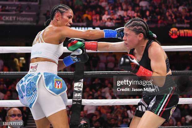 Amanda Serrano fights Yamileth Mercado in their WBC/WBO featherweight world championship during a Showtime pay-per-view event at Rocket Morgage...