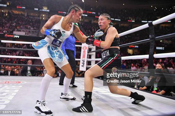 Amanda Serrano fights Yamileth Mercado in their WBC/WBO featherweight world championship during a Showtime pay-per-view event at Rocket Morgage...