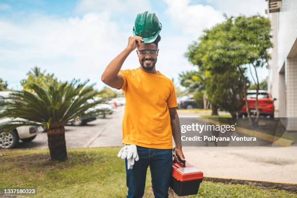 plumber electrician portrait - tradesman toolkit stock pictures, royalty-free photos & images