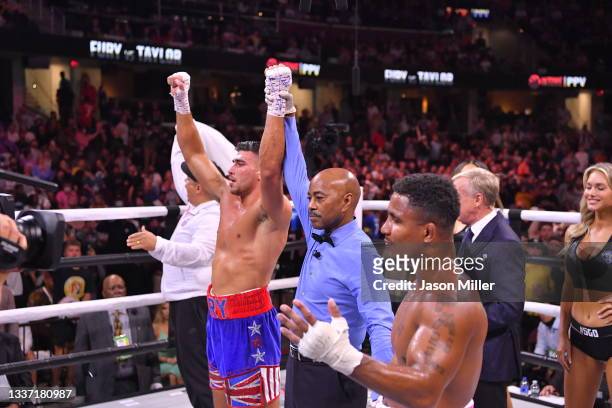Tommy Fury celebrates after defeating Anthony Taylor in their Cruiserweight bout during a Showtime pay-per-view event at Rocket Morgage Fieldhouse on...
