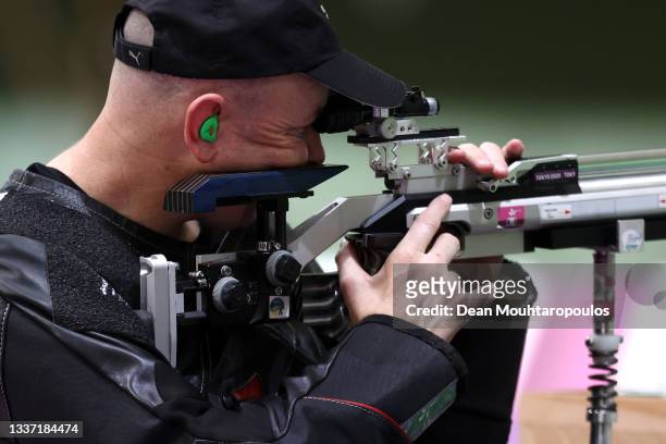 Michael Johnson of Team New Zealand competes in the R4 - Mixed 10m AR Standing SH2 Qualification on day 6 of the Tokyo 2020 Paralympic Games at Asaka...
