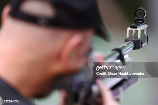 Michael Johnson of Team New Zealand competes in the R4 - Mixed 10m AR Standing SH2 Qualification on day 6 of the Tokyo 2020 Paralympic Games at Asaka...