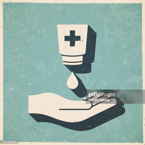 antibakterielles desinfektionsmittel gel für die hand. ikone im retro-vintage-stil - altes strukturiertes papier - hand sanitizer dispenser stock-grafiken, -clipart, -cartoons und -symbole