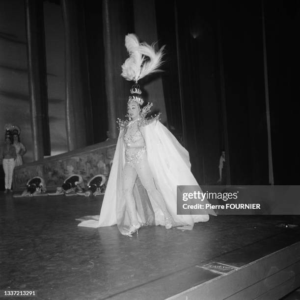 The artist Joséphine Baker on stage for a rehearsal of her new revue "Paris Mes Amours" at the Olympia Theater in Paris. .