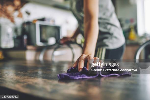cleaning of the house and apartment. - people cleaning at home stock-fotos und bilder