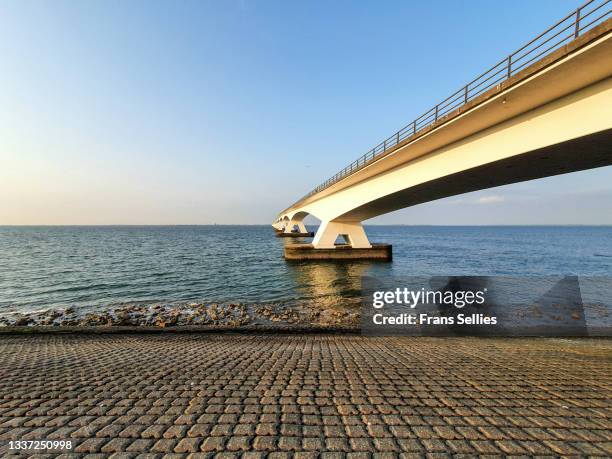 the zeelandbrug (zeeland bridge) seen from below, the netherlands - levee - fotografias e filmes do acervo