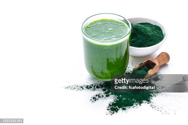 spirulina smoothie isolated on white background - pharmaceutical ingredient stock pictures, royalty-free photos & images