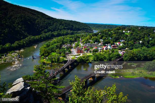 historic town of harpers ferry west virginia viewed from maryland heights - potomac river fotografías e imágenes de stock