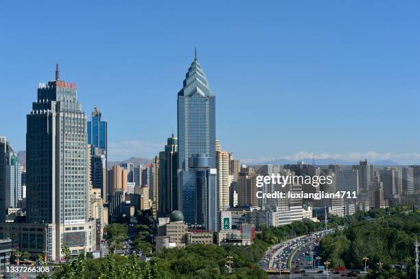 panoramic view of the urumqi city in xinjiang province - urban skyline xinjiang stock pictures, royalty-free photos & images