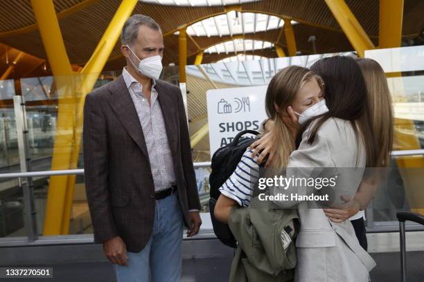 In this handout image provided by the Royal Household, Crown Princess Leonor of Spain says goodbye to her parents King Felipe VI of Spain, Queen...