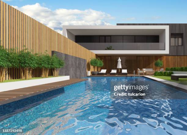 modern luxurious villa with garden and swimming pool. - miami architecture stock pictures, royalty-free photos & images