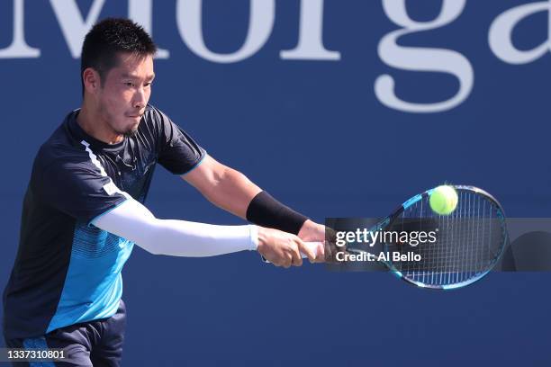 Yuichi Sugita of Japan returns against Casper Ruud of Norway during their men's singles first round match on Day One of the 2021 US Open at the...