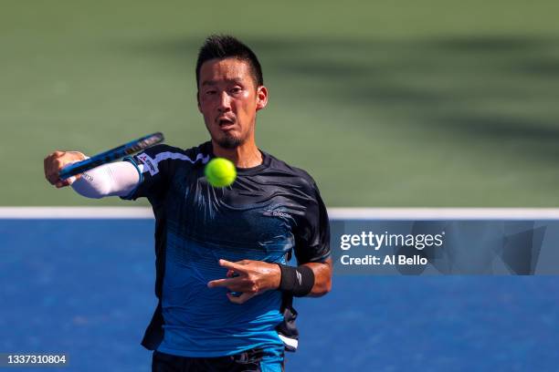 Yuichi Sugita of Japan returns against Casper Ruud of Norway during their men's singles first round match on Day One of the 2021 US Open at the...