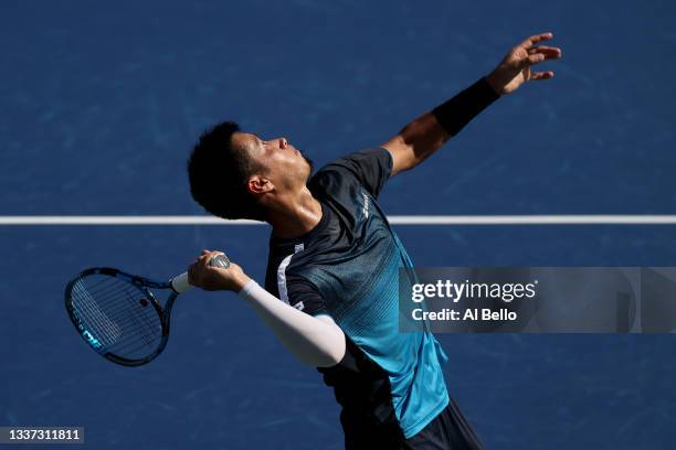 Yuichi Sugita of Japan serves against Casper Ruud of Norway during their men's singles first round match on Day One of the 2021 US Open at the Billie...