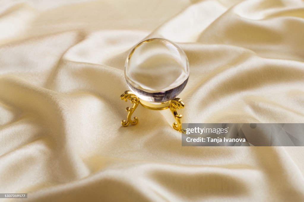 Magic Crystal Ball On Silk Fabric Background Witchcraft Ritual