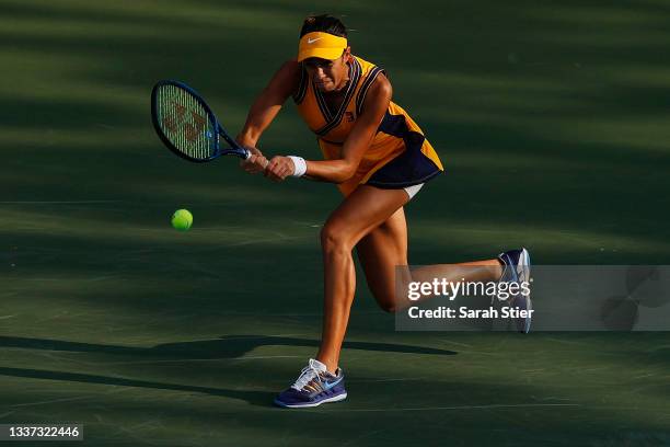 Olga Danilovic of Serbia returns a shot against Alycia Parks of United States during their women's singles first round match on Day One of the 2021...