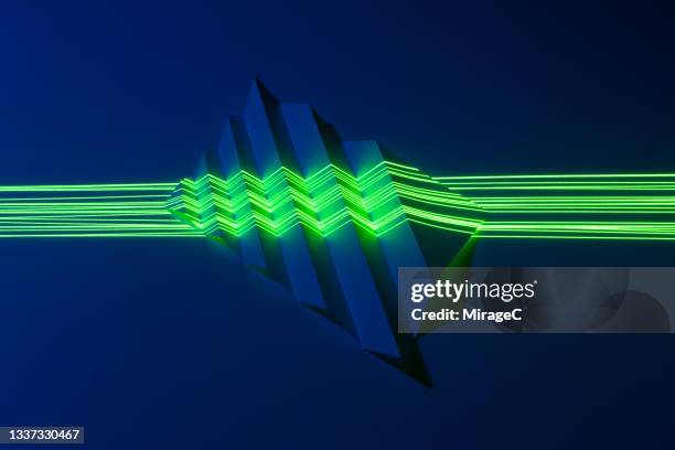 green laser scanning zigzag shaped paper - zigzag stock pictures, royalty-free photos & images