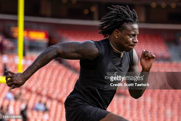 Marquise Brown of the Baltimore Ravens warms up before the preseason game against the Washington Football Team at FedExField on August 28, 2021 in...