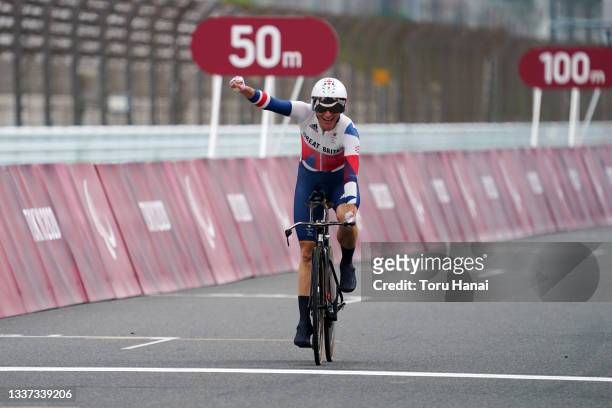 Sarah Storey of Team Great Britain celebrates winning the gold medal in the Cycling Road Women's C5 Time Trial on day 7 of the Tokyo 2020 Paralympic...