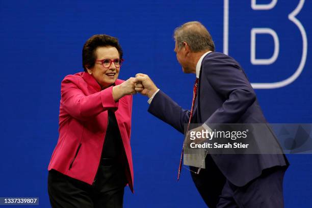 Billie Jean King fist pumps USTA Chairman, Michael McNulty prior to the match between Naomi Osaka of Japan and Marie Bouzkova of Czech Republic...