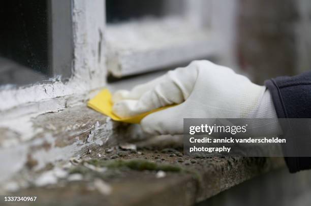 sanding peeling paint - restoration stock-fotos und bilder