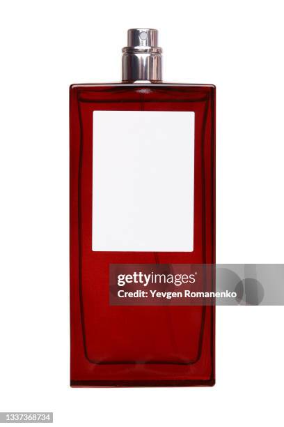 red perfume bottle isolated on white background - perfume atomizer stock pictures, royalty-free photos & images