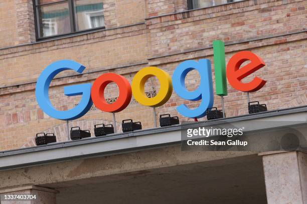 The Google corporate logo hangs outside the Google Germany offices on August 31, 2021 in Berlin, Germany. Google has announced it will invest EUR one...