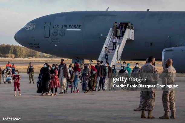 Afghan evacuees disembark from US Air Force plane at Rota Naval Base on August 31, 2021 in Rota, Spain. Spain announced it will temporarily...