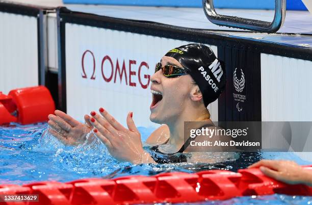 Sophie Pascoe of Team New Zealand reacts after winning gold in the Women's 100m Freestyle - S9 on day 7 of the Tokyo 2020 Paralympic Games at Tokyo...